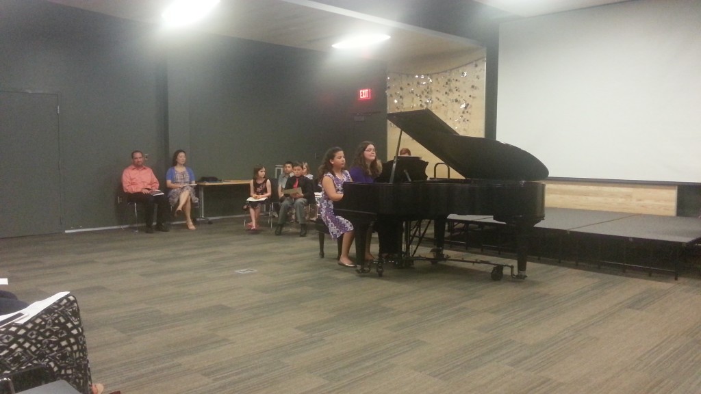 Ms. Jamie and Ashlyn playing their duet